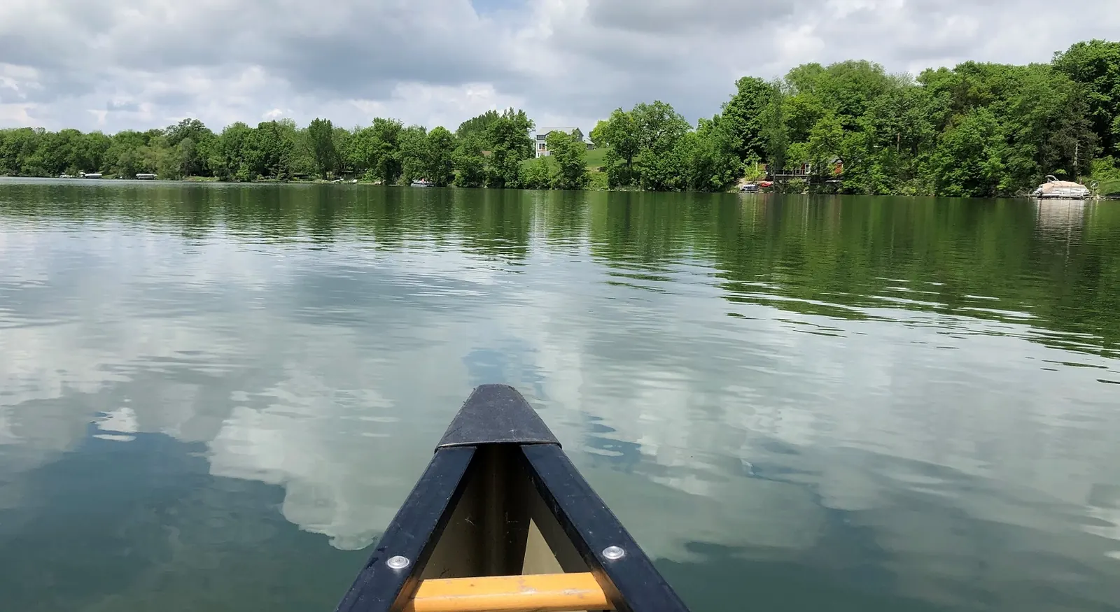 A canoe on the calm water of Rays Lake