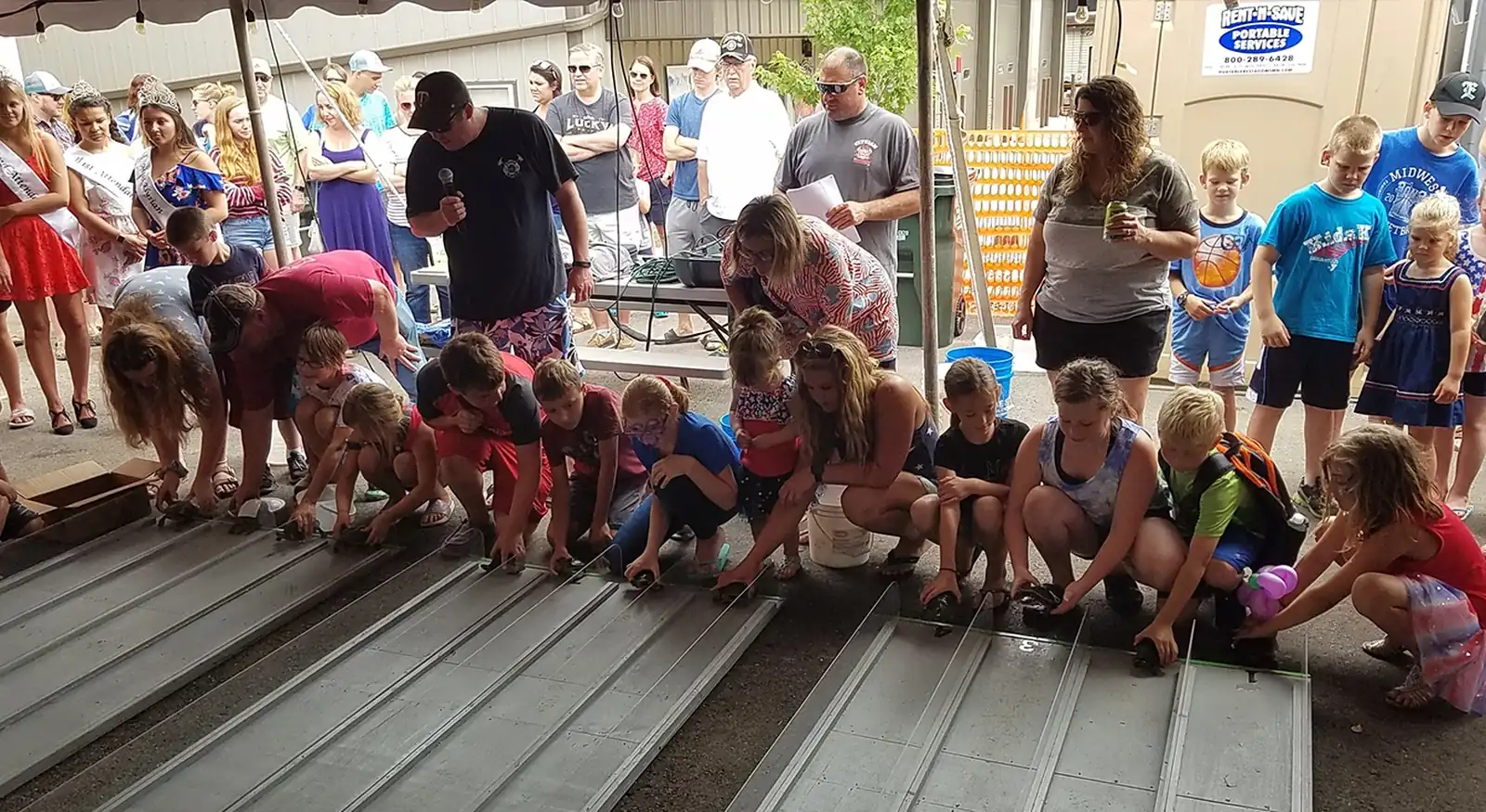 Children and families gathered for a community activity