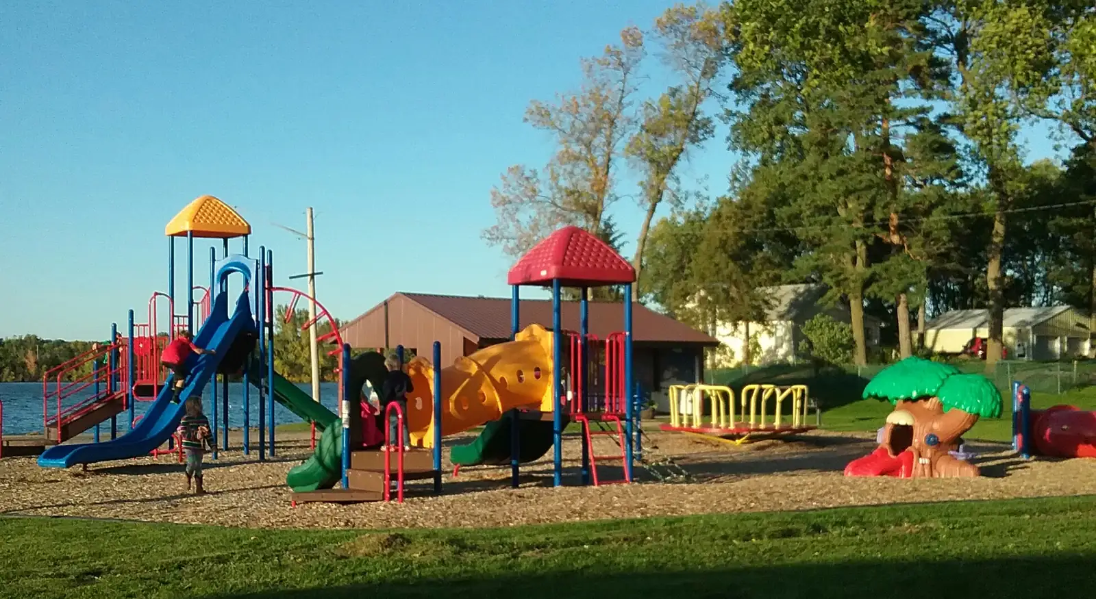 Colorful playground equipment in an Elysian park
